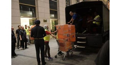 Malaysian police seize 284 luxury bags, 72 bags of .